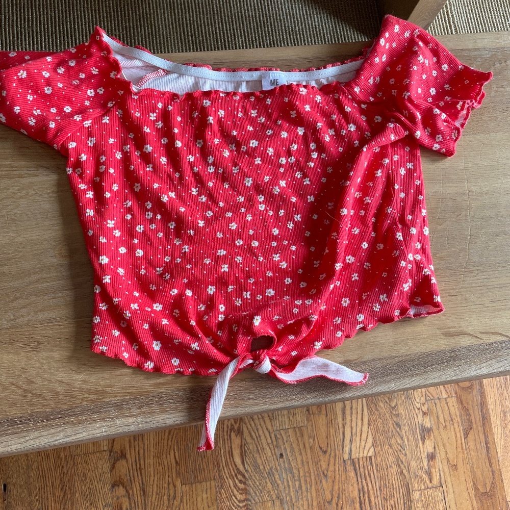 Red shoulder top with white flowers and tie